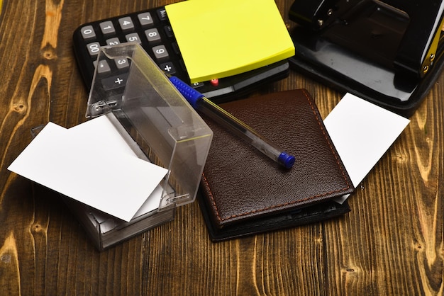 A close-up shot of different types of debt instruments like credit cards, student loan papers, and a mortgage statement, neatly organized in separate piles. The image should convey the concept of categorizing and understanding different debt types.