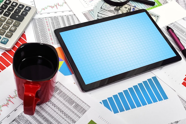 A close-up shot of a calculator and financial documents highlighting contribution limits and potential savings growth.