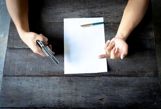 Close-up of a hand pointing to an error on a printed credit report, with a pen nearby, ready to circle the mistake.