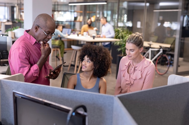 A diverse group of people working together in a modern co-working space, each focused on their laptops and projects, reflecting the collaborative and innovative environment of modern side hustles. The scene exudes teamwork, creativity, and entrepreneurial spirit, signifying a network of support and inspiration.