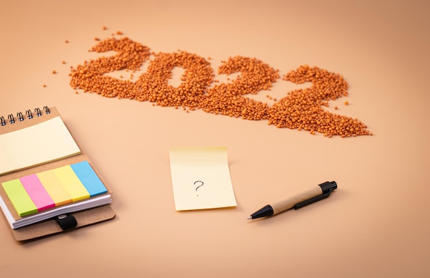 An image featuring a calendar highlighting the near future with a question mark, representing the short-term nature and temporary coverage of short-term disability insurance. The colors are soft and reassuring.