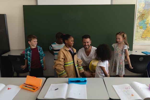 A diverse group of students participating in a school safety drill, with teachers and staff guiding them in a calm and orderly manner, showing preparedness and training.